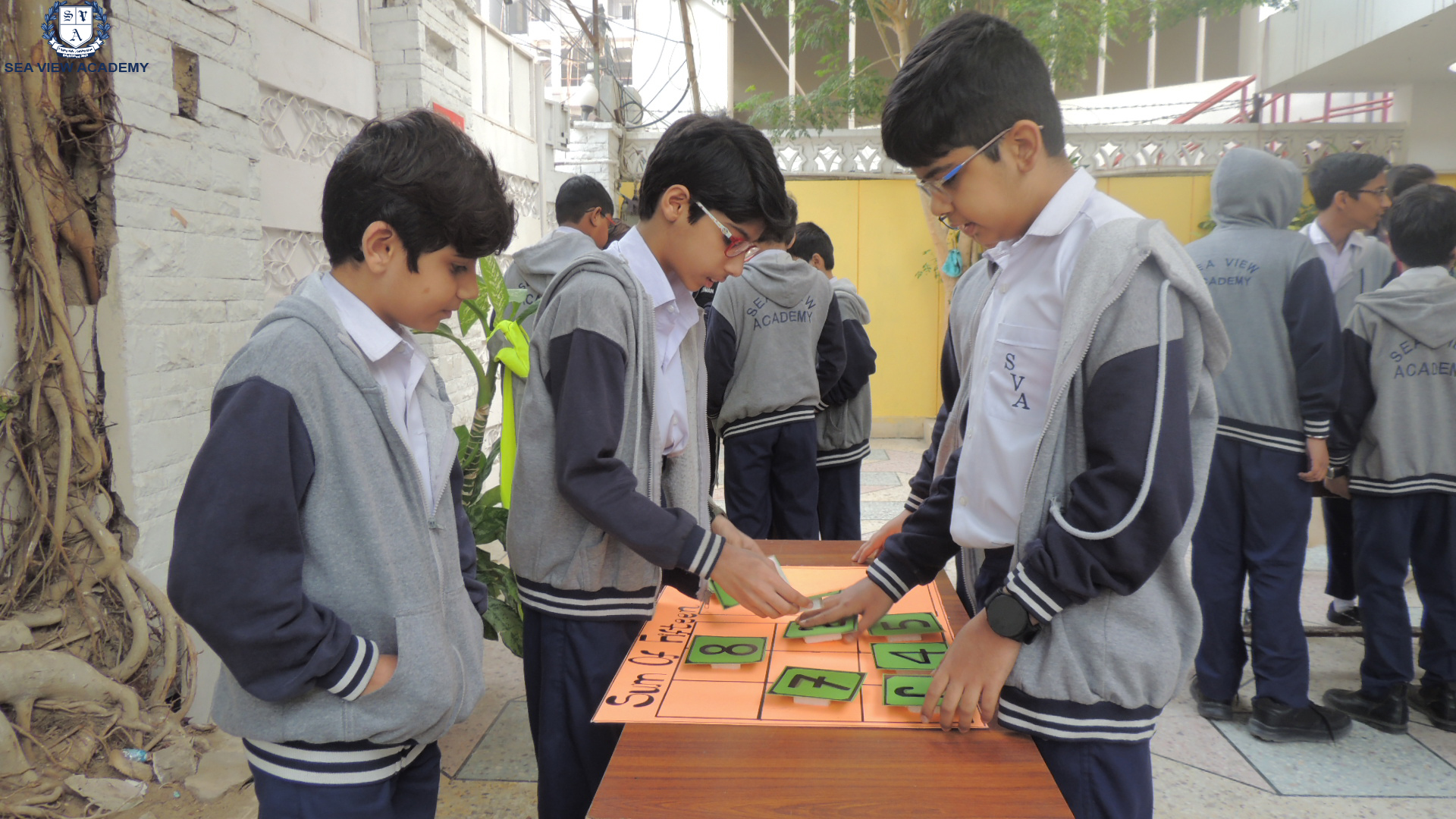 Primary students working through an activity station